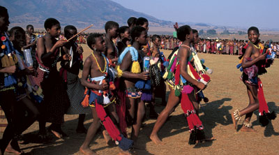 young girls in Swaziland walking to a dance