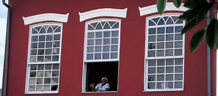 woman looking out a window