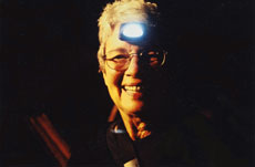 Paola wearing a miner's lamp
